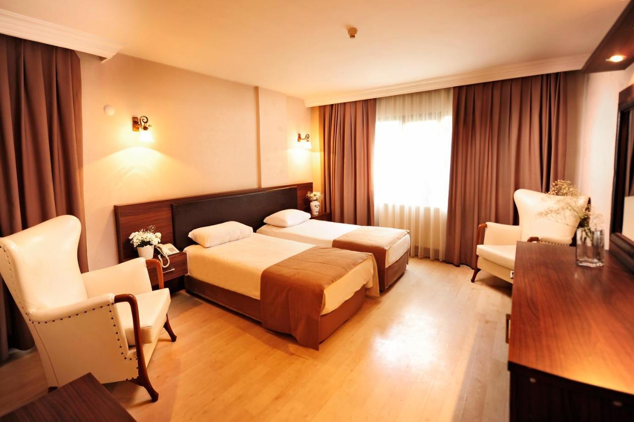 Uestuen Hotel Alsancak Измир Экстерьер фото