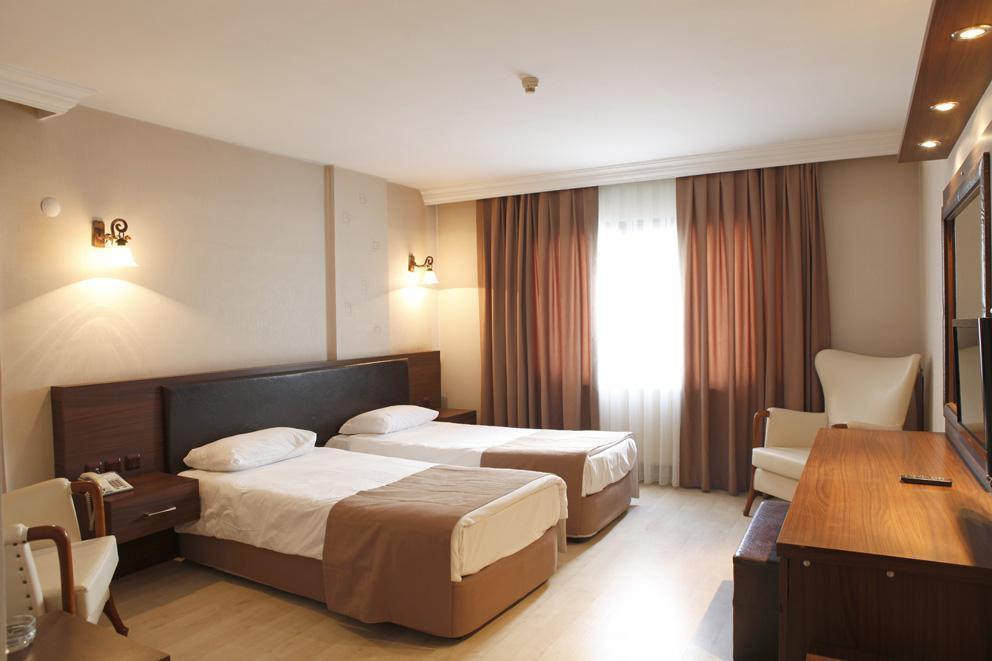 Uestuen Hotel Alsancak Измир Экстерьер фото
