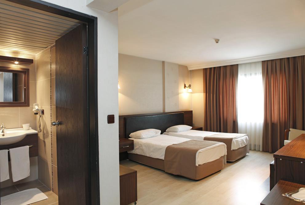 Uestuen Hotel Alsancak Измир Экстерьер фото