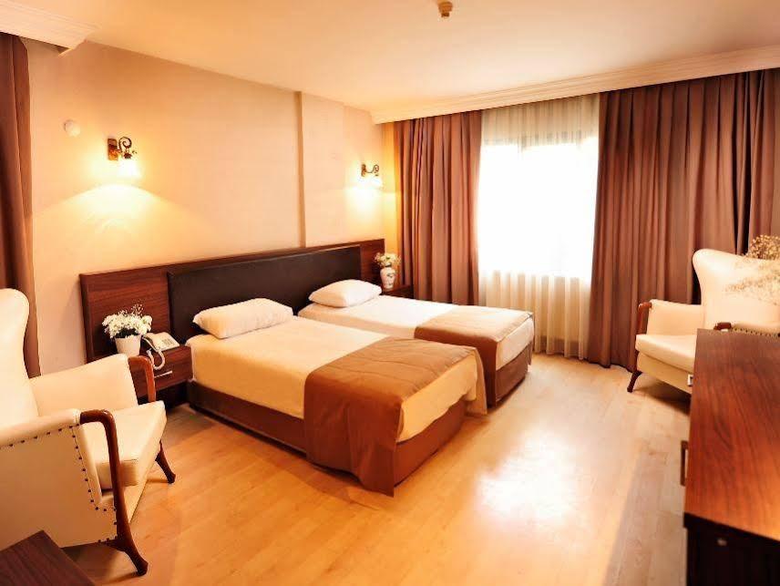 Uestuen Hotel Alsancak Измир Экстерьер фото